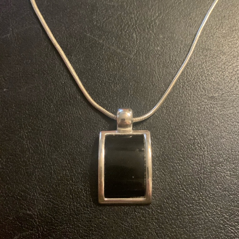 Black & silver pendant on snake chain
